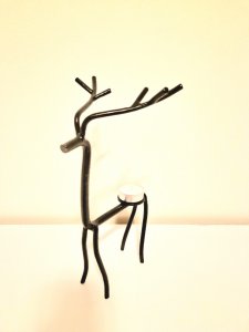 Kovový svícen jelen